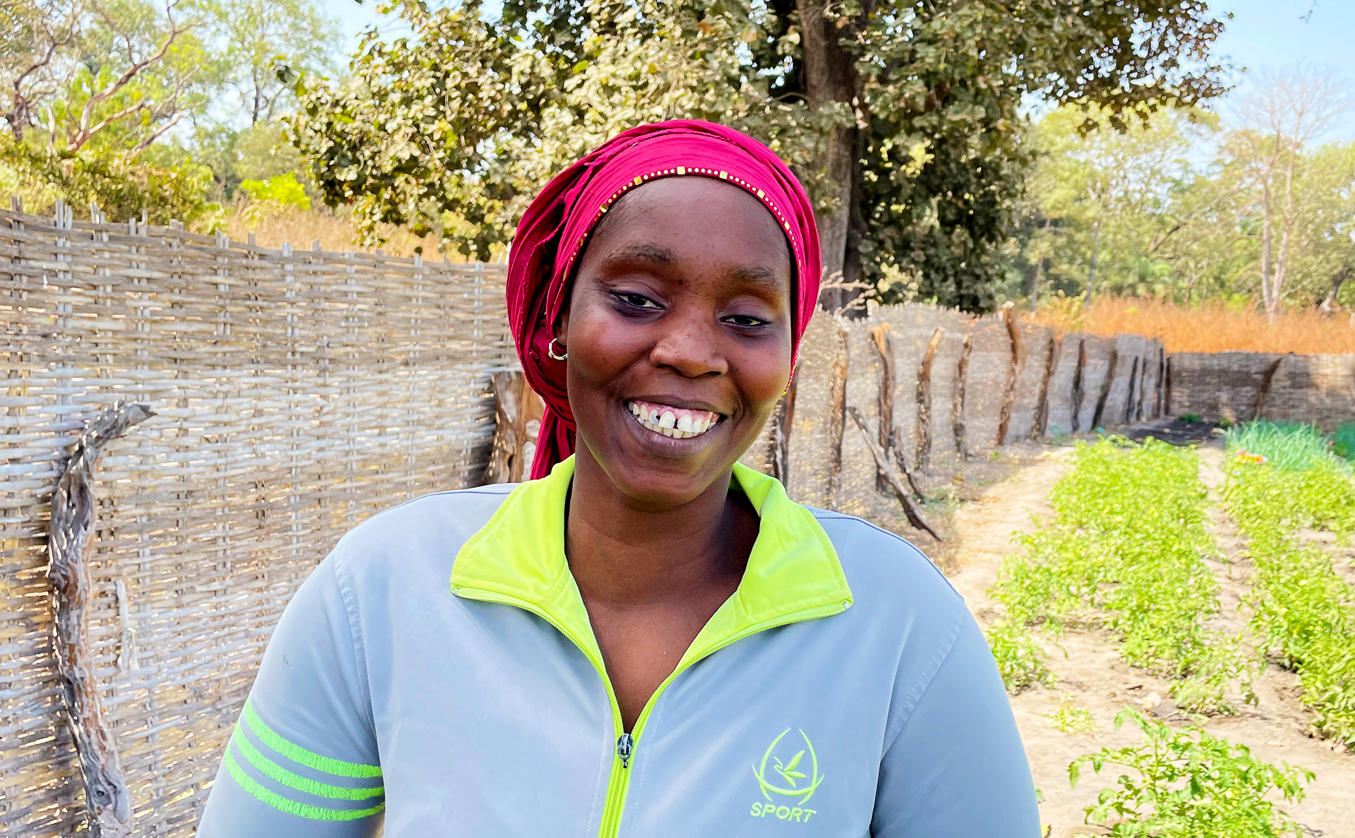 Fatoumata makes enough money from the garden to buy clothes for her children, and stocks. Photo: IOM 2022/Alpha Seydi Ba